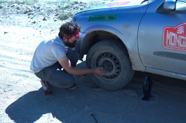 Removing the tire to investigate a mysterious grinding noise.